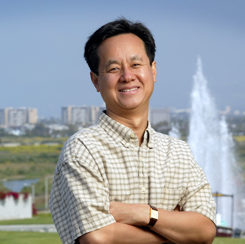 Ed Park in front of fountain on LMU campus